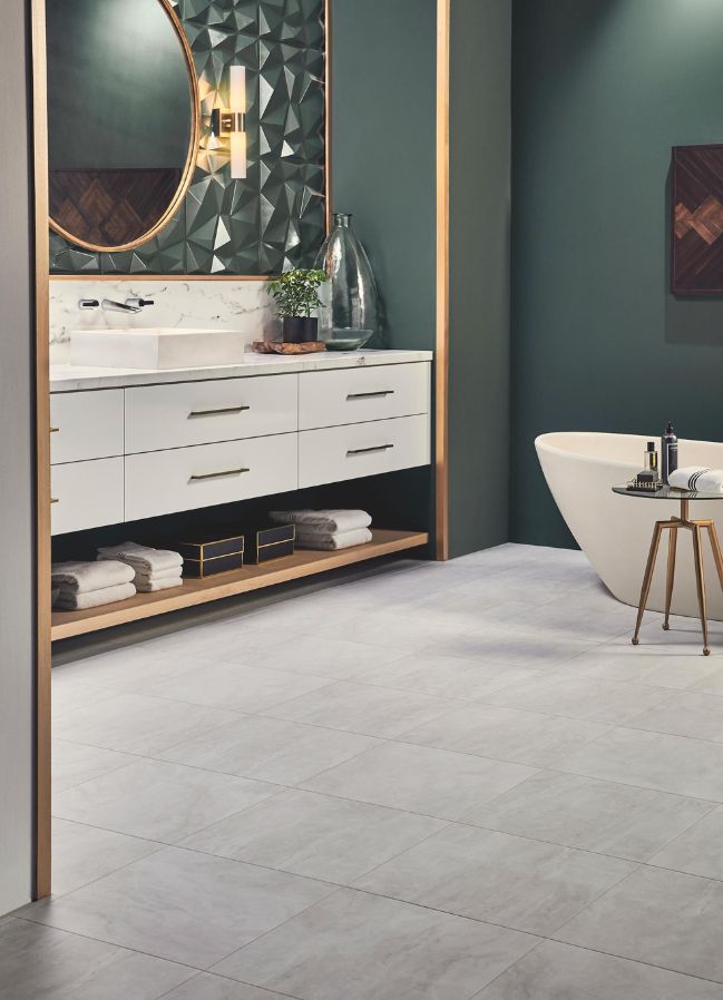 grey luxury vinyl tile floors in a stylish bathroom